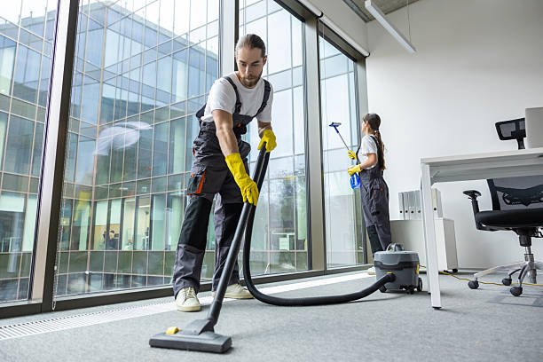 Why Clean Offices Improve Employee Productivity Professional office cleaning team at work